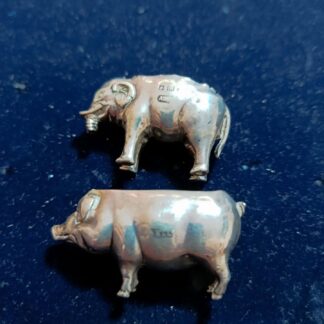 Figuras de Plata Cerdo y Elefante